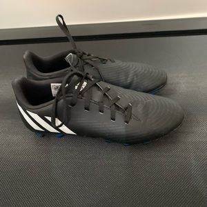 Boys black Adidas soccer cleats